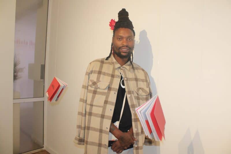The exhibition, Indlela Imbomvu, is a personal exploration of identity, lineage, and becoming.