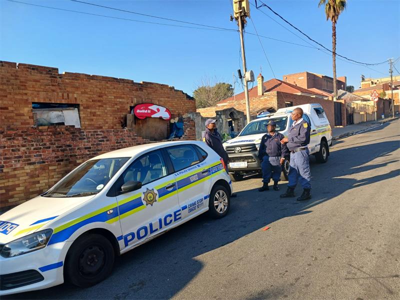 Norwood SAPS members outside burnt house on May 5, 2026. Photo: Supplied