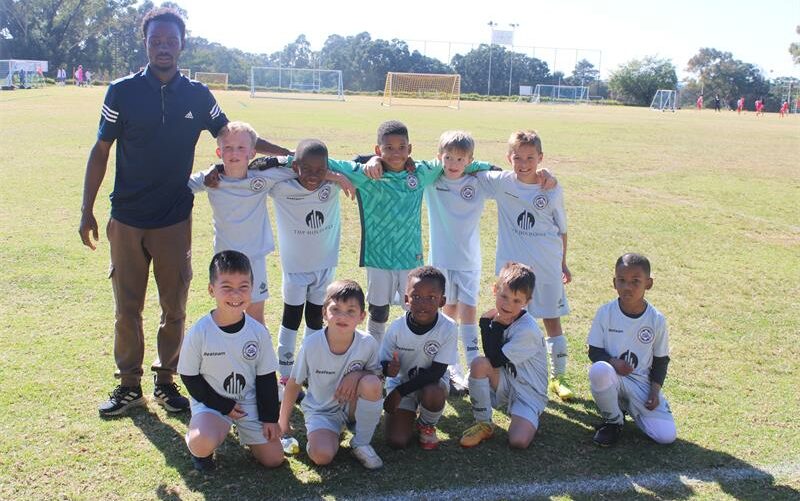 Coach Nkosikhona Maphumulo and his team, DBK, at the junior football game at Highlands Park Football Club on July 5, 2026. Photo: Thato Modopi