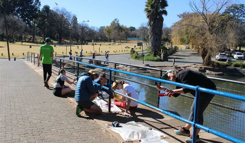 Locals paint the bridge at Zoo Lake for Mandela Day on July 18, 2026. Photo: Asanda Matlhare