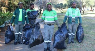CAP green team carries filled refuse bags on Mandela Day on July 18, 2026. Photo: Asanda Matlhare