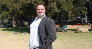 Managing Director of Roxsure Insurance Brokers and chairperson of NORA, Jason Grove, explains the importance of maintaining and keeping parks safe at James and Ethel Gray Park on July 22. Photo: Thato Modopi