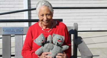 Lynne Levin showcases the soft knitted toys that she and her group knit and donate to new mothers and their babies on July 6. Photo: Thato Modopi