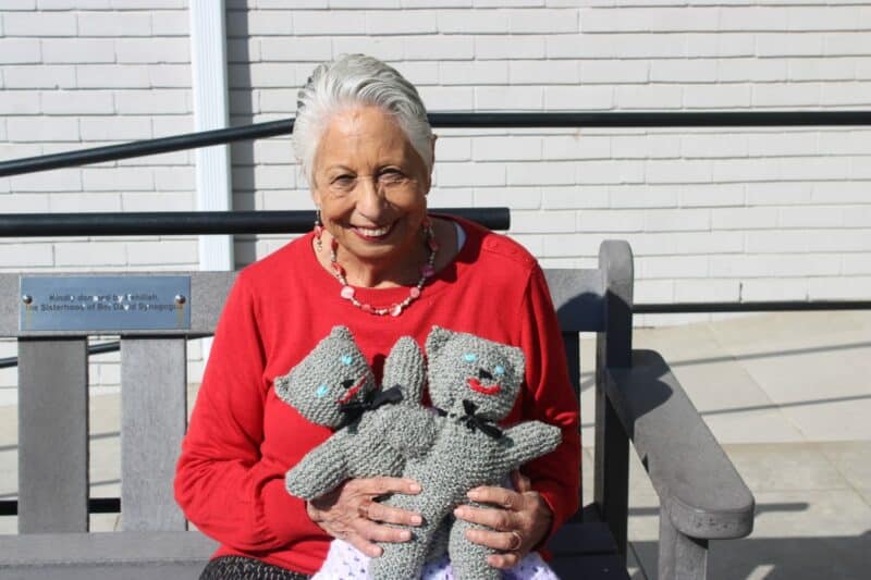Lynne Levin showcases the soft knitted toys that she and her group knit and donate to new mothers and their babies on July 6. Photo: Thato Modopi