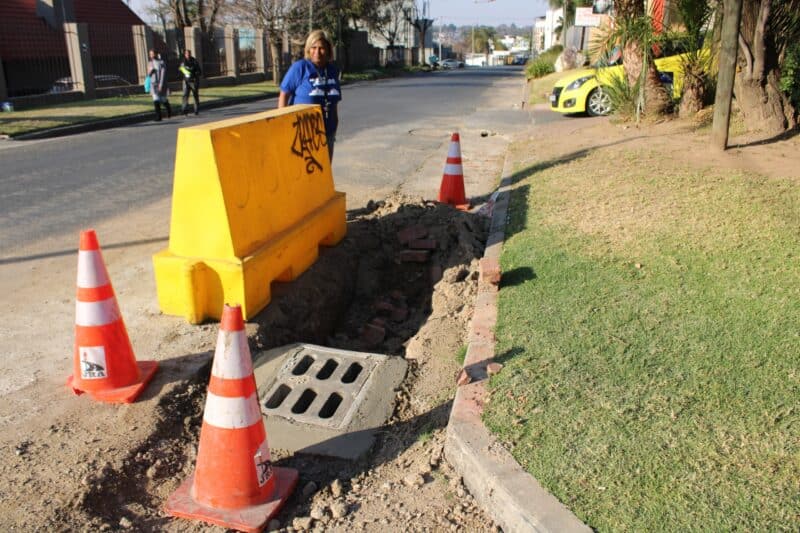 Ward 74’s councillor, Belinda Kayser-Echeozonjoku inspects the subsoil drainage system being constructed by JRA on July 9, 2026. Photo: Asanda Matlhare