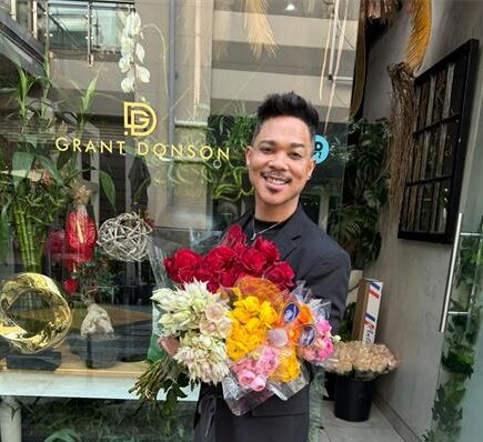 Entrepreneur and founder of Flowers by Grant Donson, Grant Donson prepares to arrange a bouquet in his store on August 19, 2026. Photo: Asanda Matlhare