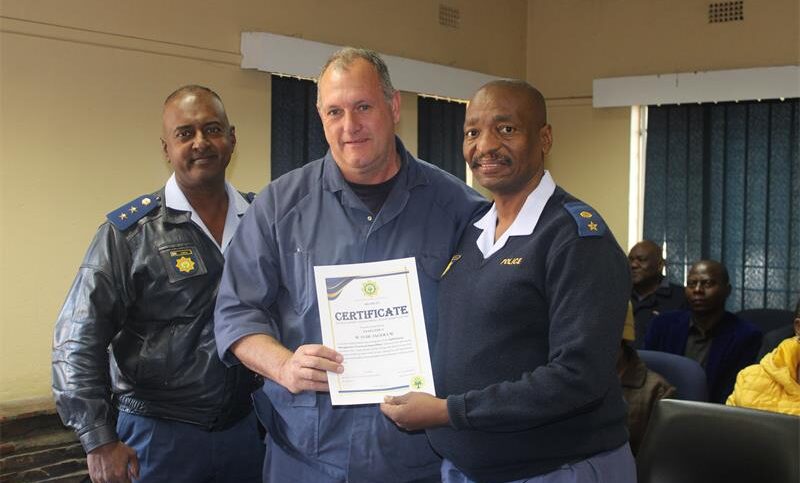 Bramley SAPS station commander Colonel Chetty and Lieutenant Colonel Thapelo Molepo present Warrant Officer Jacques De Jager with a certificate of recognition for his hard work on July 29. Photo