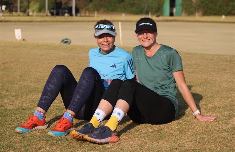 Liesl Hollis and Cristina Karadimitriadis catch a breather after completing a 5km trail on August 8, 2026. Photo: Asanda Matlhare