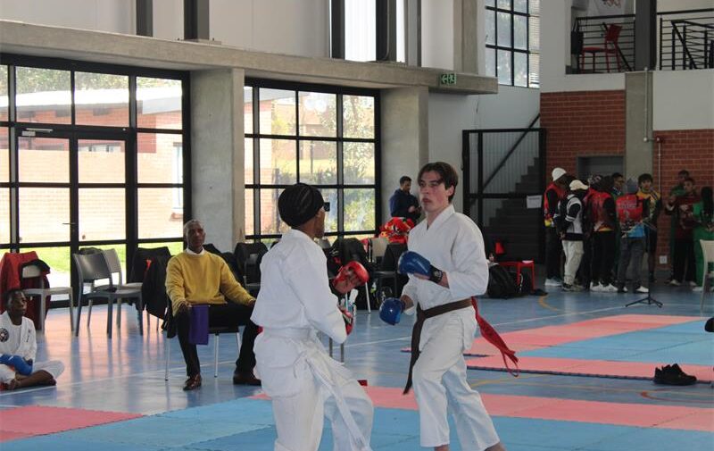 Bohlale Ngakane and Riccardo Bonaretti battle it out on the mat during the karate fighting division on July 25, 2026. Photo: Thato Modopi