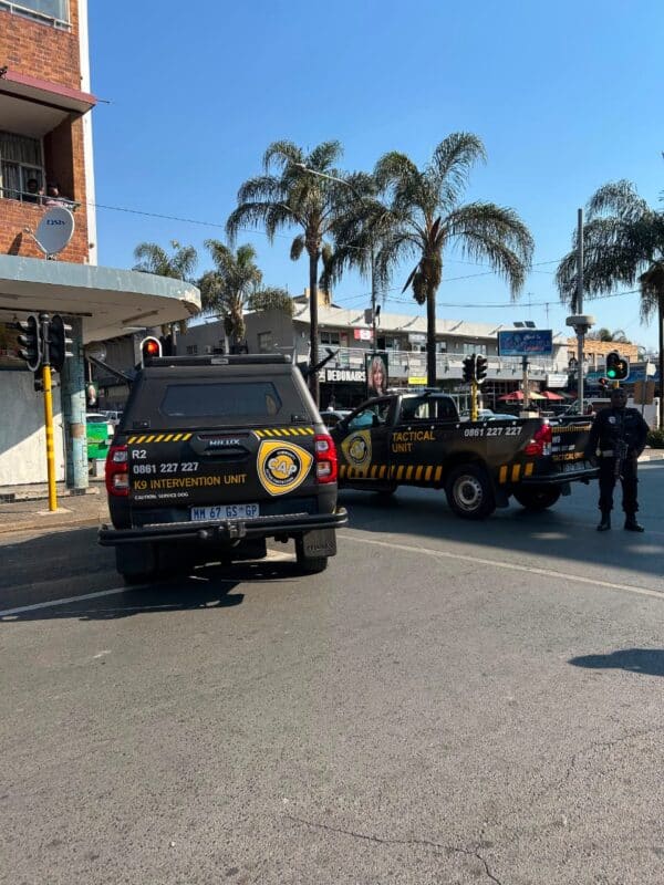 CAP Security has blocked Grant Avenue as the March and March protest nears the Norwood Police Station. Photo: Asanda Matlhare