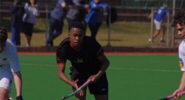 Parktown's Dalindyebo Tsengiwe makes a run for it during the first side's hockey game on Saturday, July 25.