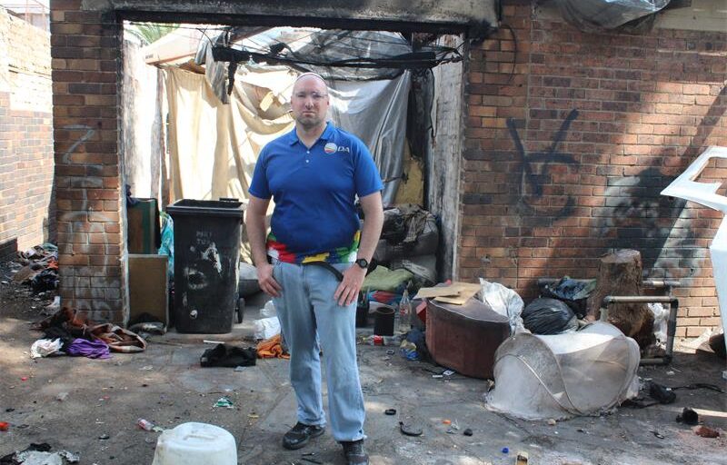Ward 72 councillor Daniel Schay stands in the poor state of the property in Sydenham on September 14, 2026. Photo: Asanda Matlhare