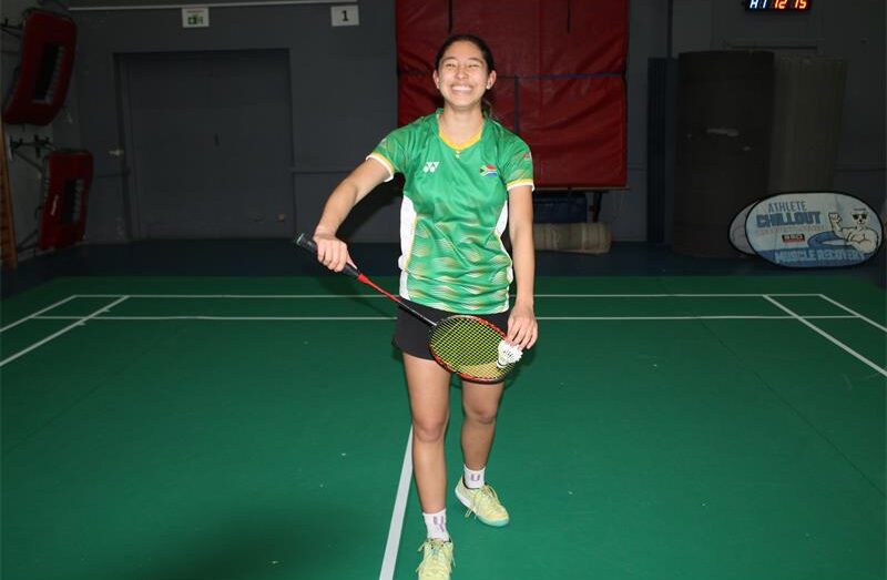 Badminton player Layla Niayesha takes the midcourt to serve on August 23, 2026. Photo: Asanda Matlhare