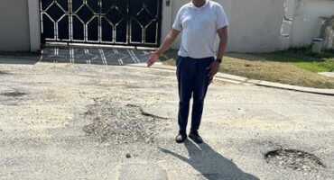 Community leader, Theo Lengwati shows the poor state of Crystal Road in Bramley on August 28, 2026. Photo: Asanda Matlhare