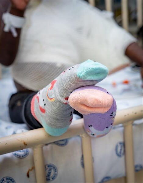Smile Foundation beneficiary with mismatch socks. Photo: Supplied