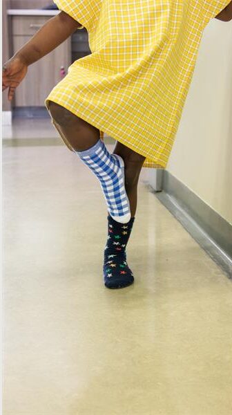 Smile Foundation beneficiary with mismatch socks. Photo: Supplied