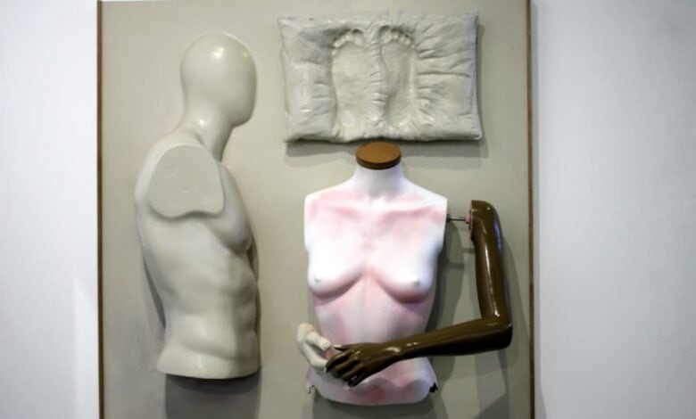 Mounted on a flat, putty-grey panel, this relief sets two mannequin torsos side by side in Houghton on October 1, 2026. Photo: Naziya Davids-Easthorpe