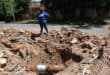 Ward 74 councillor Belinda Echeozonjoku stands on the dangerous excavation on the corner of 28 Junction Road in Bramley on October 13, 2026. Photo: Asanda Matlhare