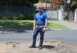 Ward 72 councillor Daniel Schay stands in between the new potholes that have emerged on Northfield Avenue. Photo taken on October 26, 2026 by Asanda Matlhare