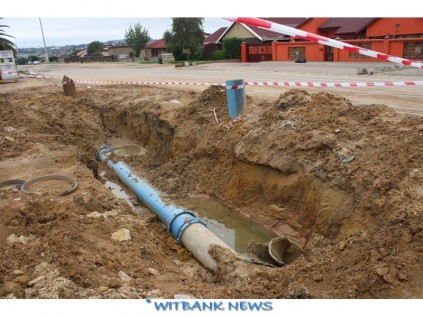A leaking water pipe being fixed at Willie Ackerman Street in Ackerville.