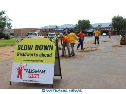 Everyone lends a hand in the Fix-a-pothole project.