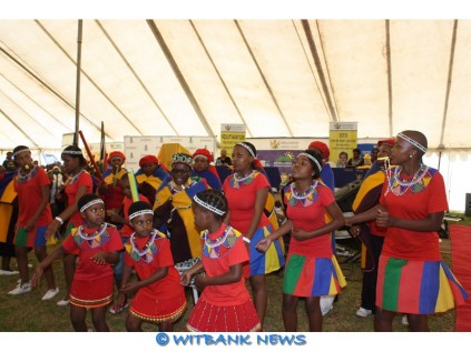 The Ndebele group Tjhida Ngitjhudule in their colorful attire during their performance during the official handover of Thanduxolo Special School in Klarinet.