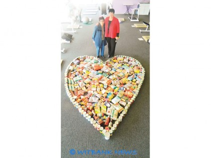 The staff of Curves displayed the groceries in a shape of a heart, confirming our logo that says "For the love of our city".