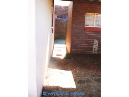 The overflowing sewage spills out at Mr John Masango’s yard in Wilge near Phola.
