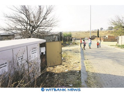 Children play a few metres away from the open substation in Zulu Street, Lynnville.