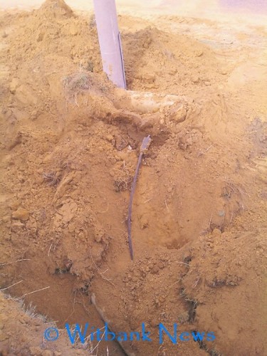 A hole was dug to repair the water leak, however it was not filled.