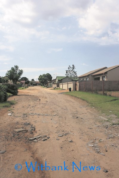 Owen Mlisa Street is not tarred or paved like the rest of the streets in Ackerville.