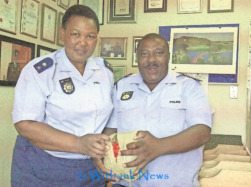 Capt David Mlombo and Lt Col Cecilia Mayisela with some of the dagga that was confiscated.