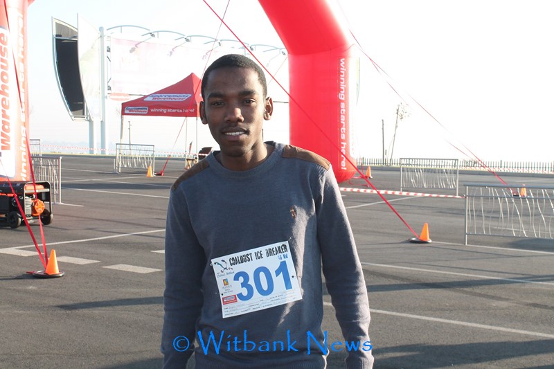 a)Bongani Simelane competing in the 10km race on June 13 at Highveld Mall for the Coaldust Roadrunners Ice Breaker race. 
