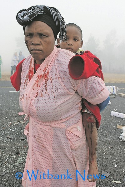 This woman who had a cut on her cheek and the injured children who walked around the accident scene in the mist looking for shoes. (Photo:Samantha Traill).