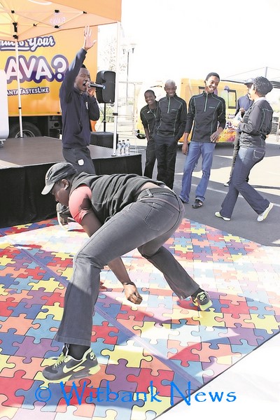 A dancer on the Fanta dance area where dancers were taught interactive and playful Fanta-Cise dance to embrace the spirit of the Whatsyourflava #Fantatastelike campaign.