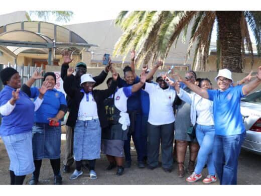 Members of the St Joseph Mukasa Catholic Church served a warm meal on Mandela Day.