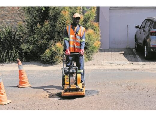 Bright Maheu tending to potholes.