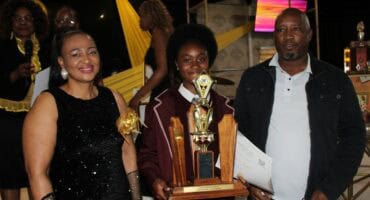 Vuma Primary School principal Mrs Xolile Mtshali, Lungile Lazaro, and deputy chairperson Given Nkambule at the Vuma Primary School prize-giving ceremony.