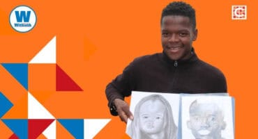 Sizwe Mathabela with his drawings.