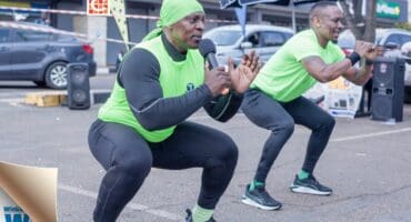 Mr T is leading the morning’s exercise routine.