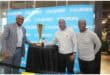 Witbank High Principal Richard Usinga, North-West University representative Michael Selena,and South African soccer legend Marks Maponyane.