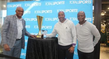 Witbank High Principal Richard Usinga, North-West University representative Michael Selena,and South African soccer legend Marks Maponyane.