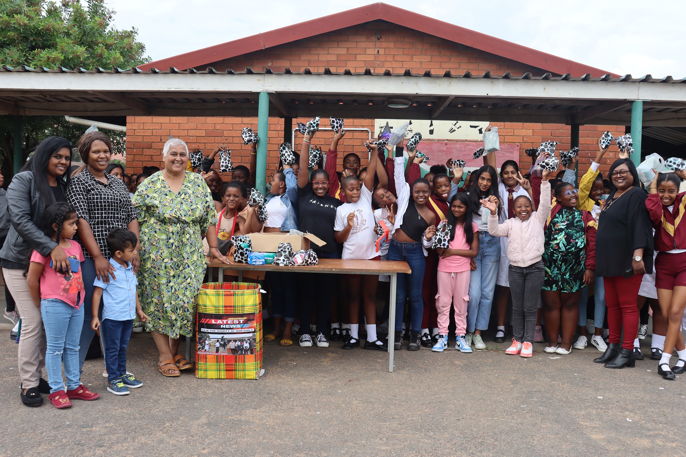 Sanitary pad donations at Nizam Road Primary School Rising