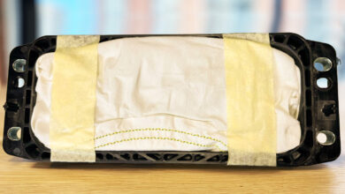 A folded and taped unsafe refitted airbag