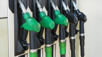 Different gas diesel pistols, at gas station.