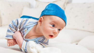 How to help your baby learn to roll over