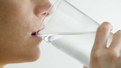 Woman Drinking Glass of Water