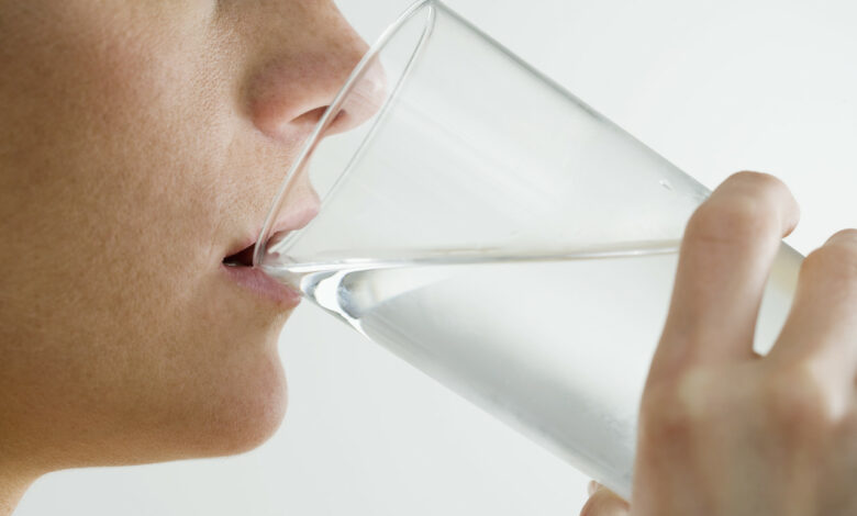 Woman Drinking Glass of Water