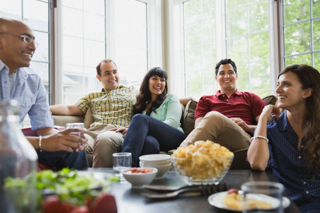 Friends socializing at home.