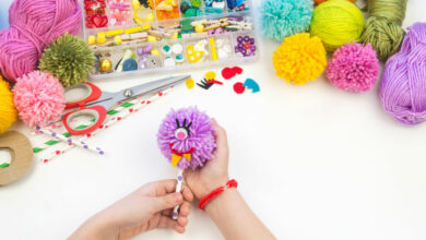 Help your child make a pom pom monster